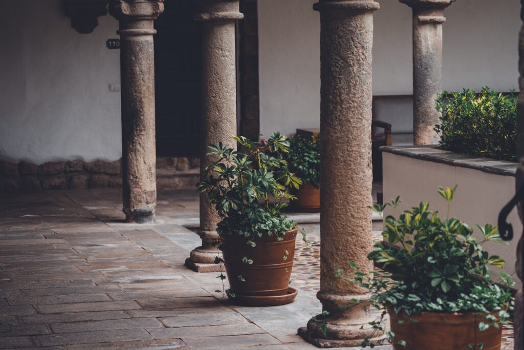 landscaping with succulents - four concrete pillar