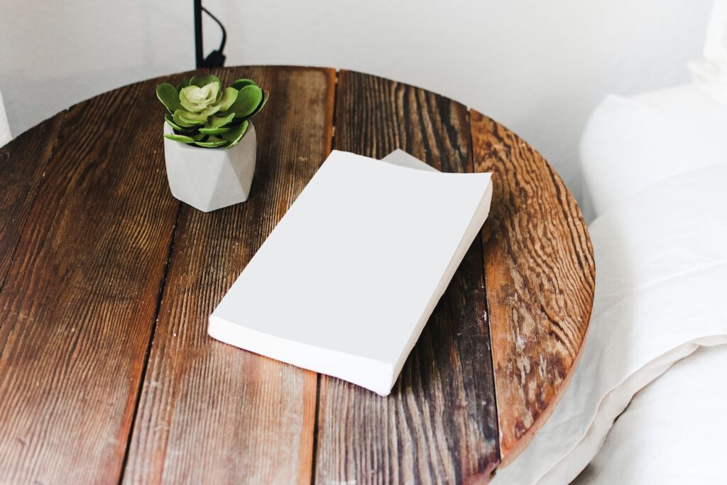 succulent table runners - White Book on Brown Round Table