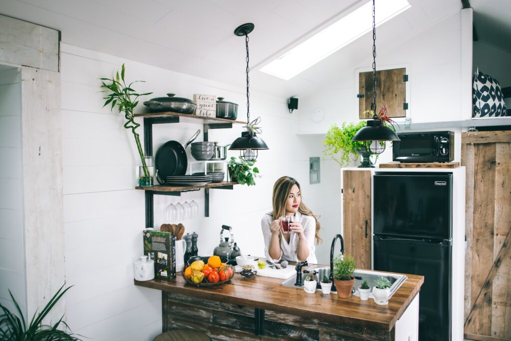 succulents for digestive health - woman sitting in front of table