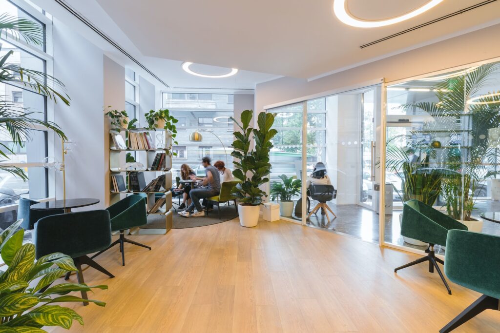 succulents in office spaces - brown wooden table with chairs